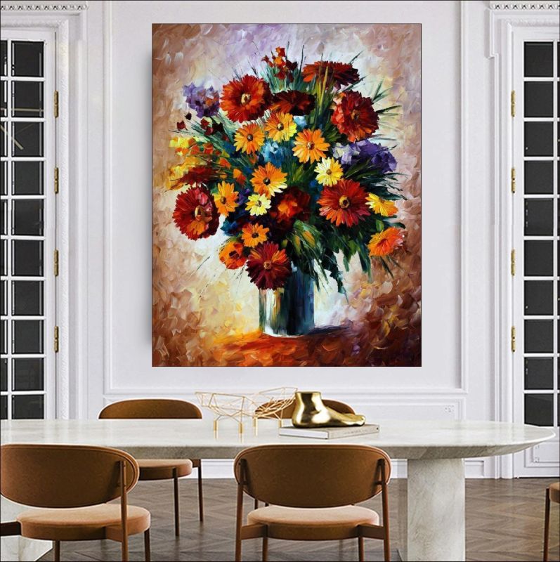 Textured painting of a vibrant flower bouquet in a vase with red, yellow, orange and purple flowers on canvas.