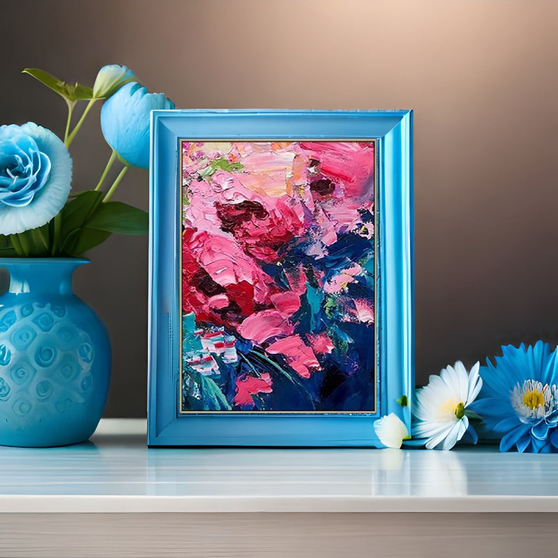 Bold abstract floral painting in pink and blue with thick textured brushstrokes, inspired by modern expressionism.