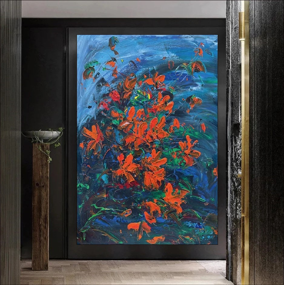 Handmade painting of red flowers on a blue background with textured brushstrokes, perfect for nature-inspired decor.