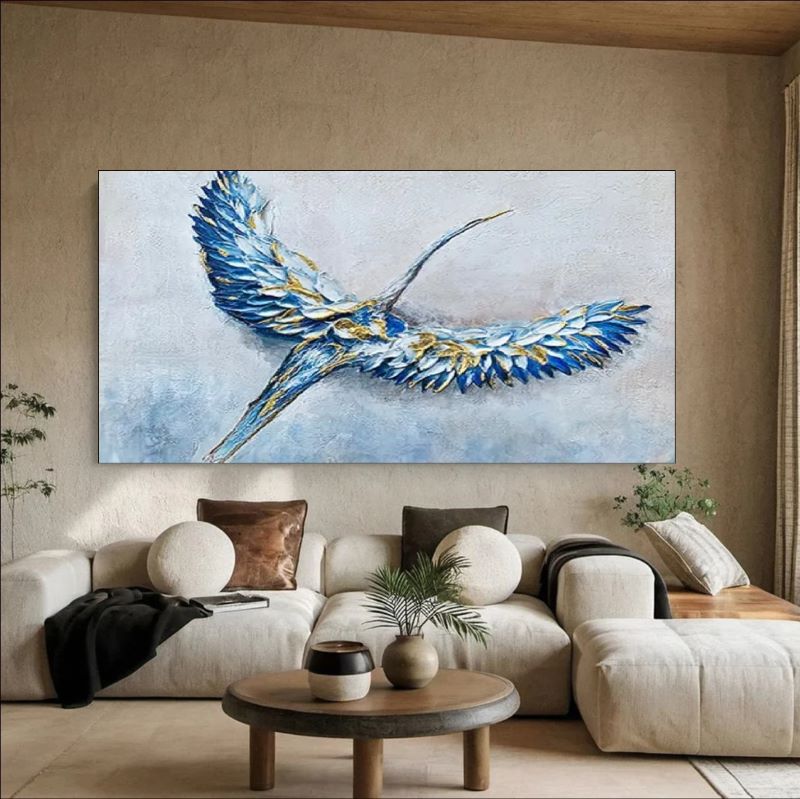 Textured oil painting of a majestic blue and white crane bird in flight with gold leaf accents on its wings, elegant wildlife wall art.