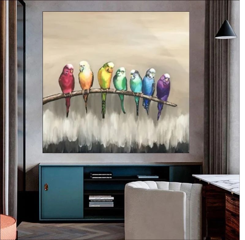 Painting of seven colorful parrots in rainbow hues perched in a row on a branch against a neutral beige background, whimsical bird wall art.