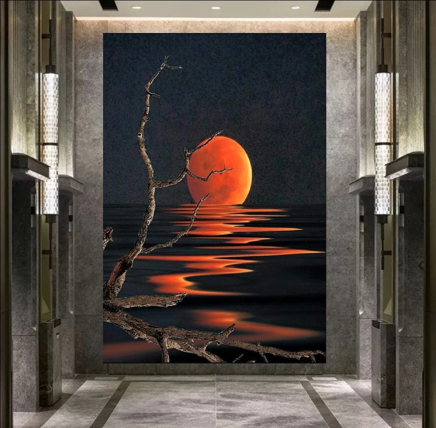 Artistic depiction of a red sun setting over water with bare branches in the foreground.