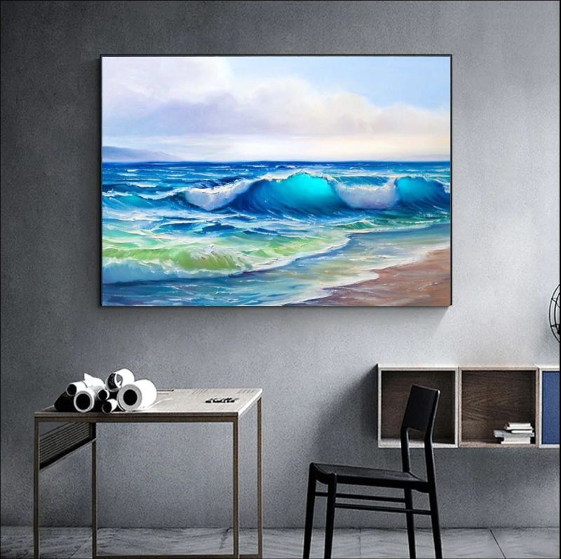 Modern living room with a beige sofa, colorful pillows, and a large framed artwork of a beach scene.