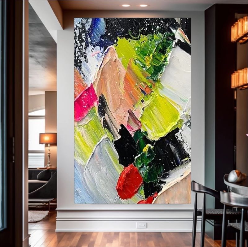 Vibrant abstract painting featuring chaotic impasto strokes of neon green, bright red, yellow, and black, modern expressionist wall art style.