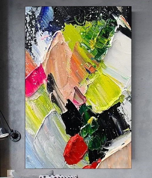 Vibrant abstract painting featuring chaotic impasto strokes of neon green, bright red, yellow, and black, modern expressionist wall art style.