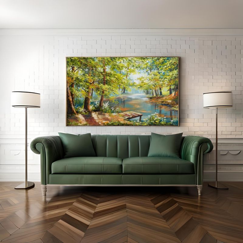 Living room with a brown leather sofa and a large painting of a forest scene on the wall.