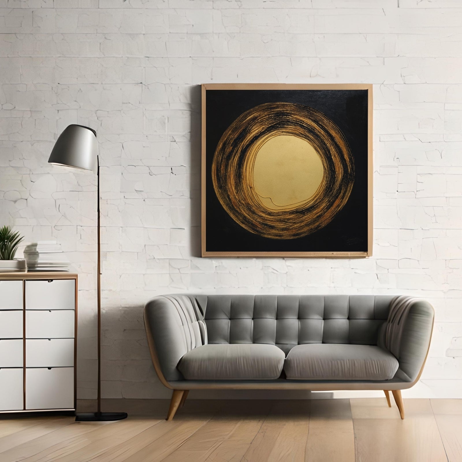 Minimalist abstract painting of a large metallic gold circle surrounded by textured, circular brushstrokes in black and bronze on a dark square canvas.