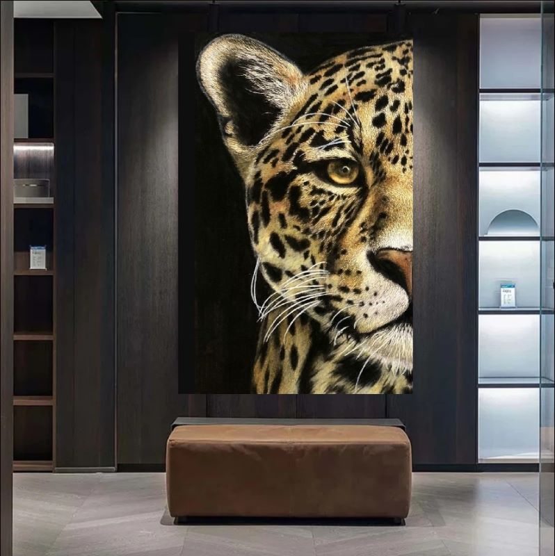 Realistic oil painting close-up of a leopard's face with piercing amber eyes and detailed spots against a black background, wildlife wall art.