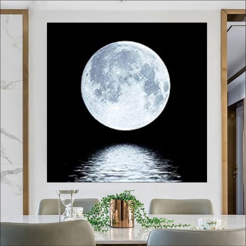 Realistic painting of a bright white full moon reflecting on dark rippling water against a pitch-black background, serene night landscape art.