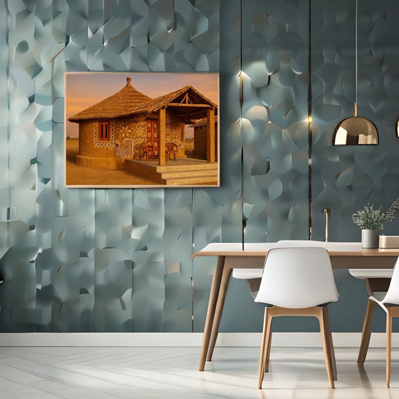 Traditional Rajasthani mud house painting featuring intricate white folk art motifs, floral mandalas, and a thatched roof, rustic Indian village wall decor.