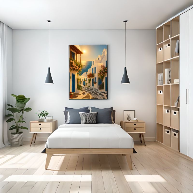 Modern bedroom with wooden bed, nightstands, and a Whitewashed Cycladic houses in Oia, Santorini Painting – Greek island architecture wall art in Mediterranean style with golden sunset light.