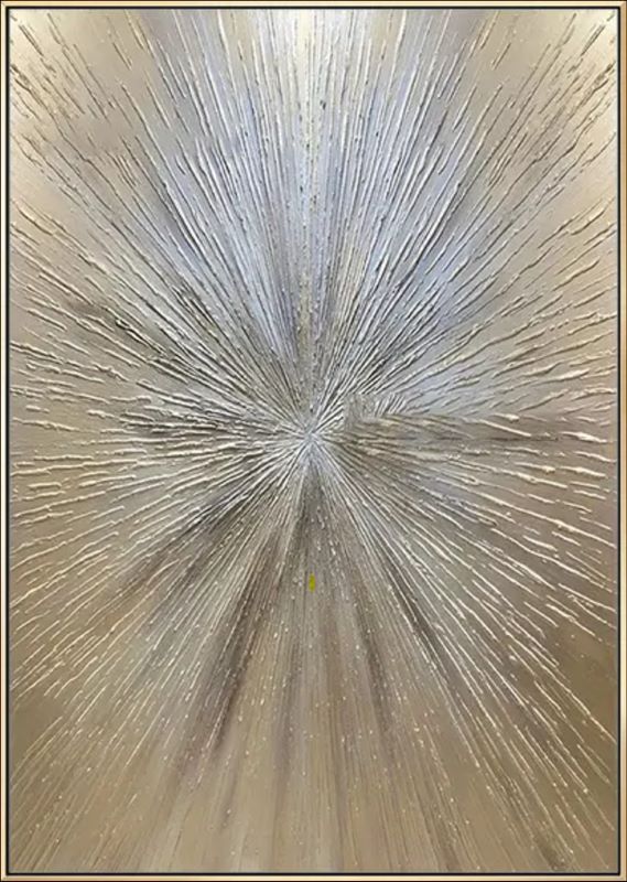Decorative wall art with a starburst design.