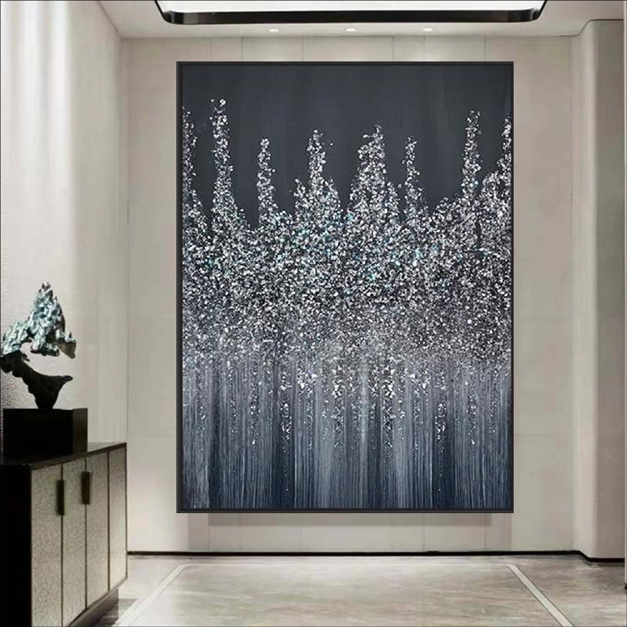 An abstract painting featuring a silver, glittering skyline against a dark midnight background. The artwork showcases a textured design with cascading metallic accents, evoking a sense of elegance and modernity