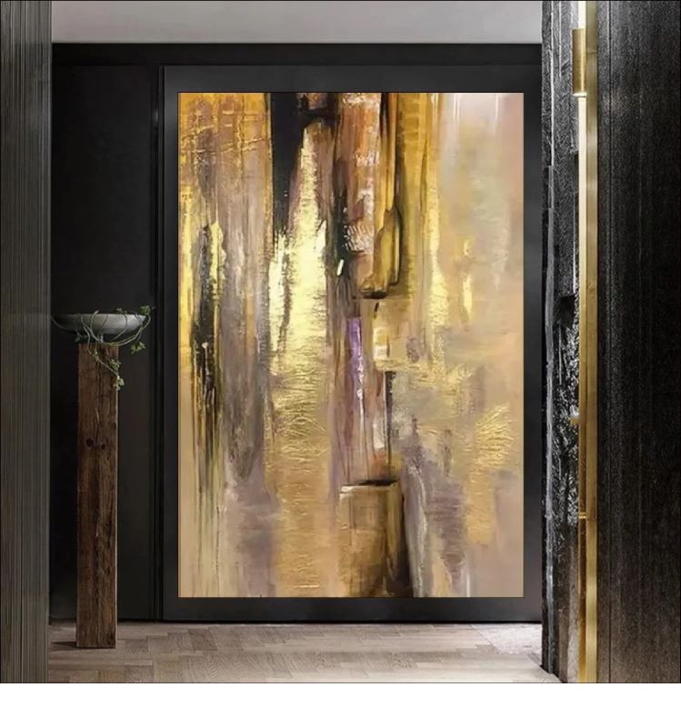 Vertical abstract painting featuring cascading strokes of gold foil, beige, and dark brown textures, modern luxury wall art style.